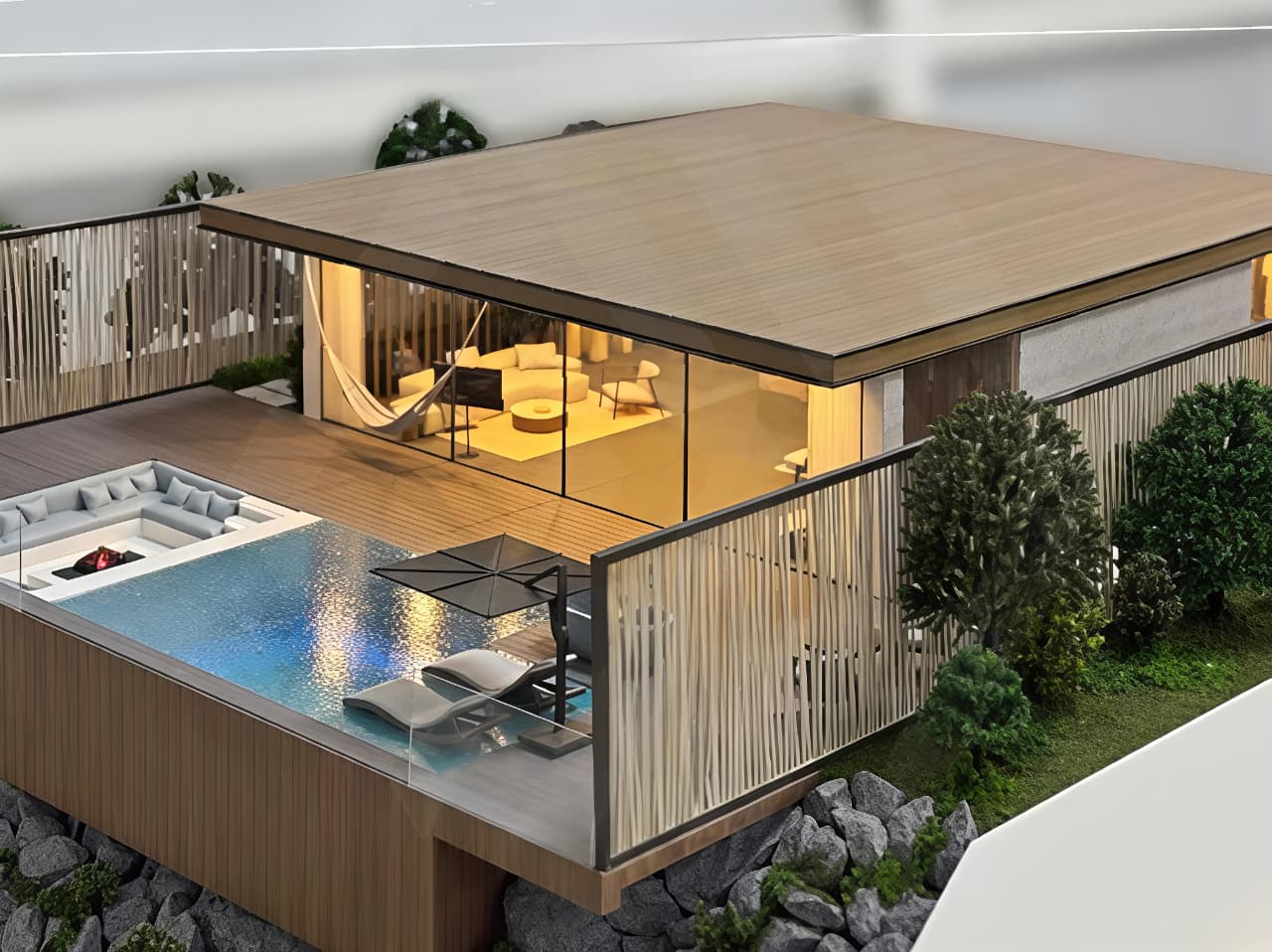 Miniature luxury villa model with pool and terrace